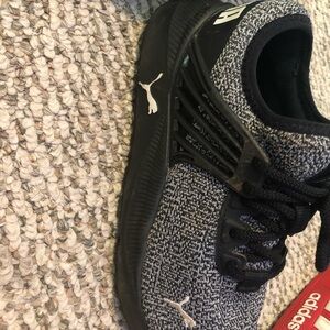 Barely used kids Puma tennis shoes.